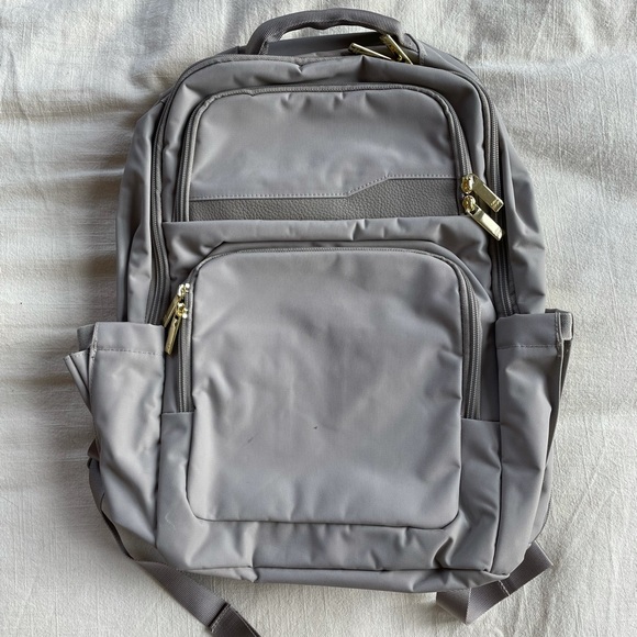 Gray backpack with gold details - Picture 2 of 3